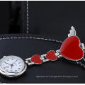 Reloj de enfermera del metal del cuarzo del precio de fábrica de Yxl-960 reloj dulce diseño del corazón con el reloj sonriente del uso del uso médico de la cara